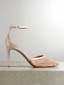 Fishnet and patent-leather pumps Fishnet and patent-leather pumps