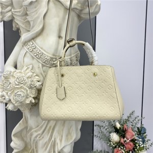 Louis Vuitton Montaigne MM Monogram Empreinte Leather New Creme Louis Vuitton Montaigne MM Monogram Empreinte Leather New Creme
