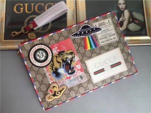 Gucci Courrier GG Supreme Pouch (Varied Colors) Gucci Courrier GG Supreme Pouch (Varied Colors)