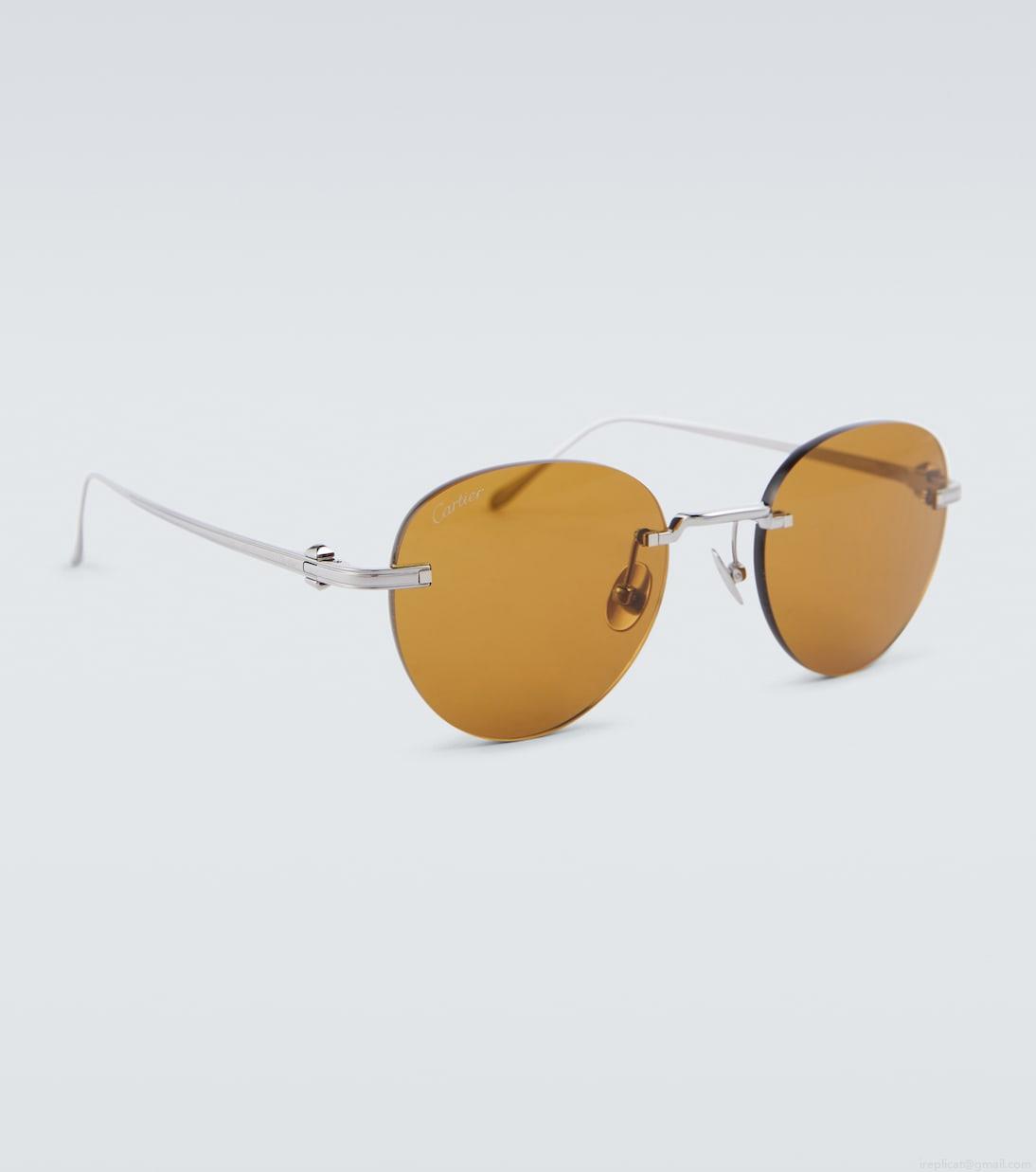 Cartier Eyewear CollectionPasha de Cartier round sunglasses Cartier Eyewear CollectionPasha de Cartier round sunglasses