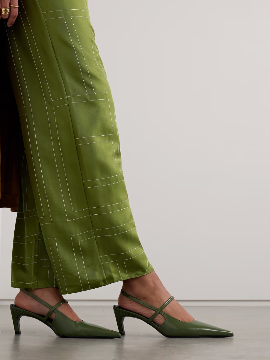 The Sharp cutout glossed-leather slingback pumps The Sharp cutout glossed-leather slingback pumps