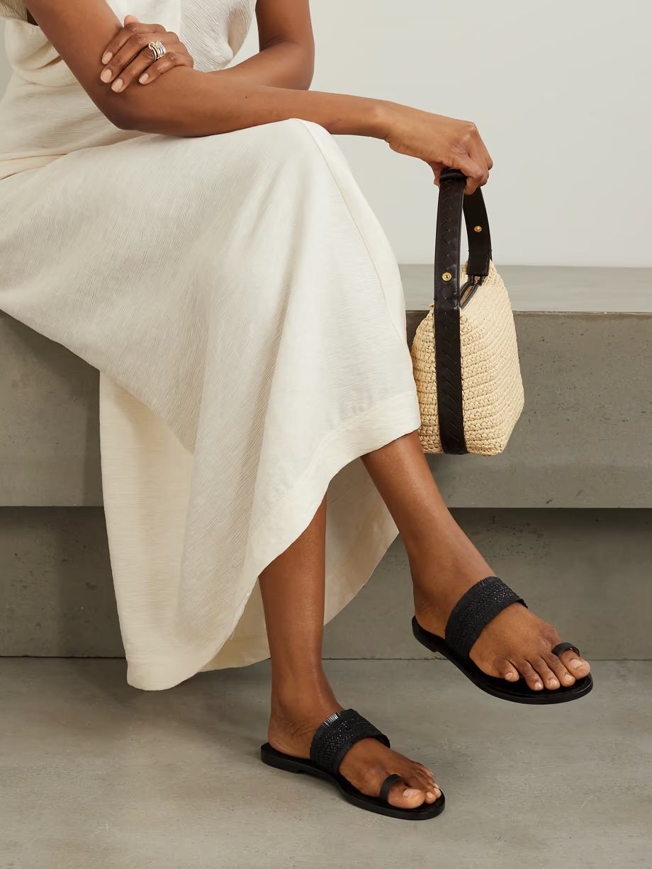 The Shela fringed braided leather slides The Shela fringed braided leather slides