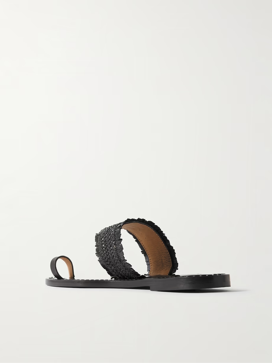 The Shela fringed braided leather slides The Shela fringed braided leather slides
