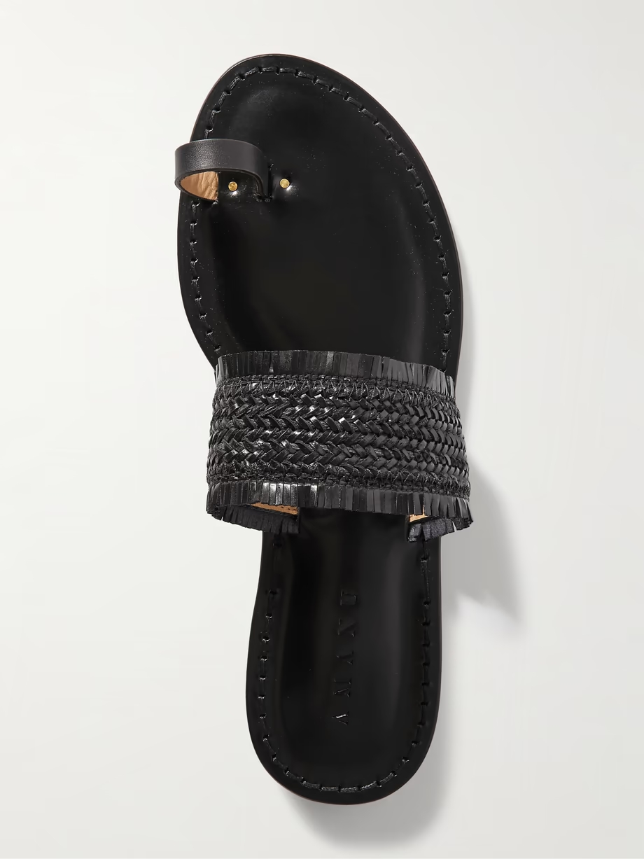 The Shela fringed braided leather slides The Shela fringed braided leather slides