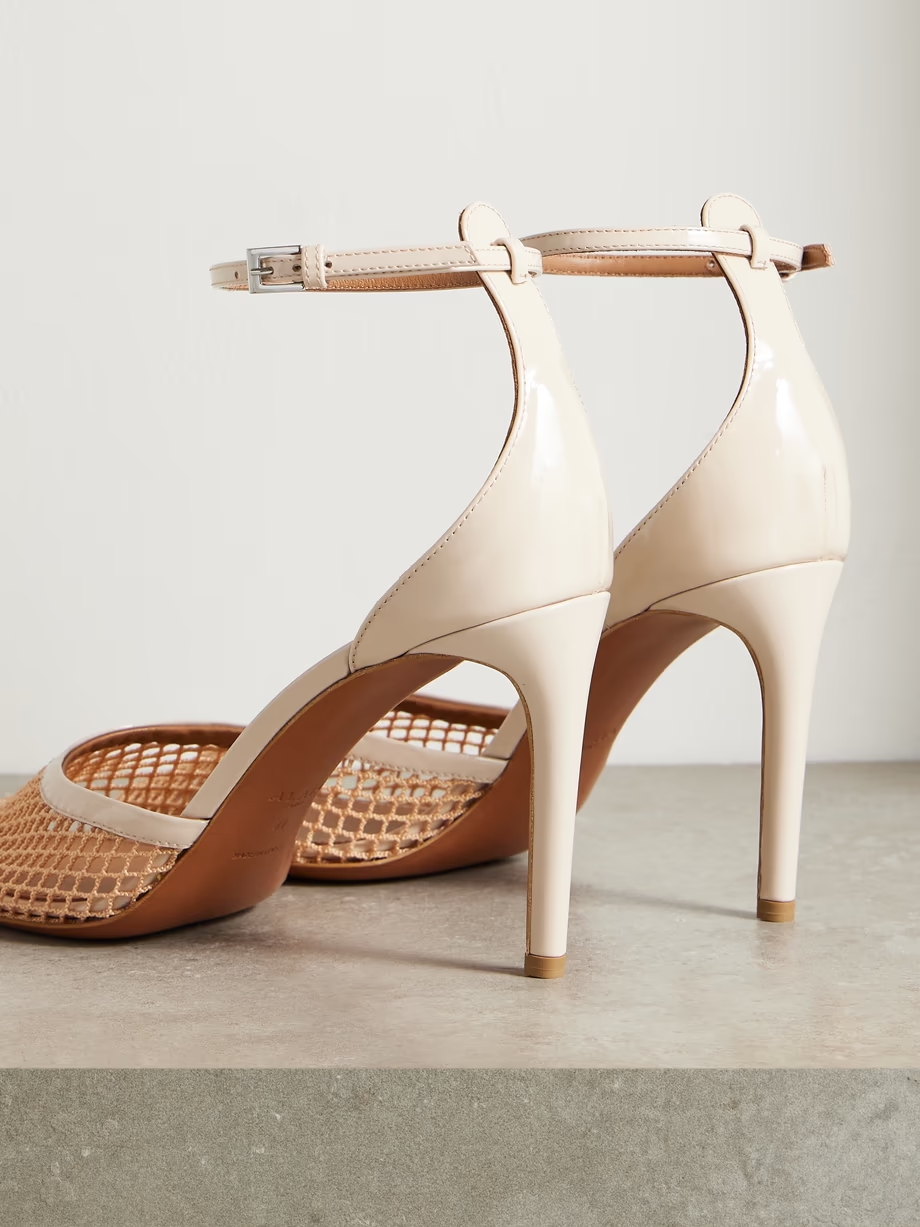 Fishnet and patent-leather pumps Fishnet and patent-leather pumps