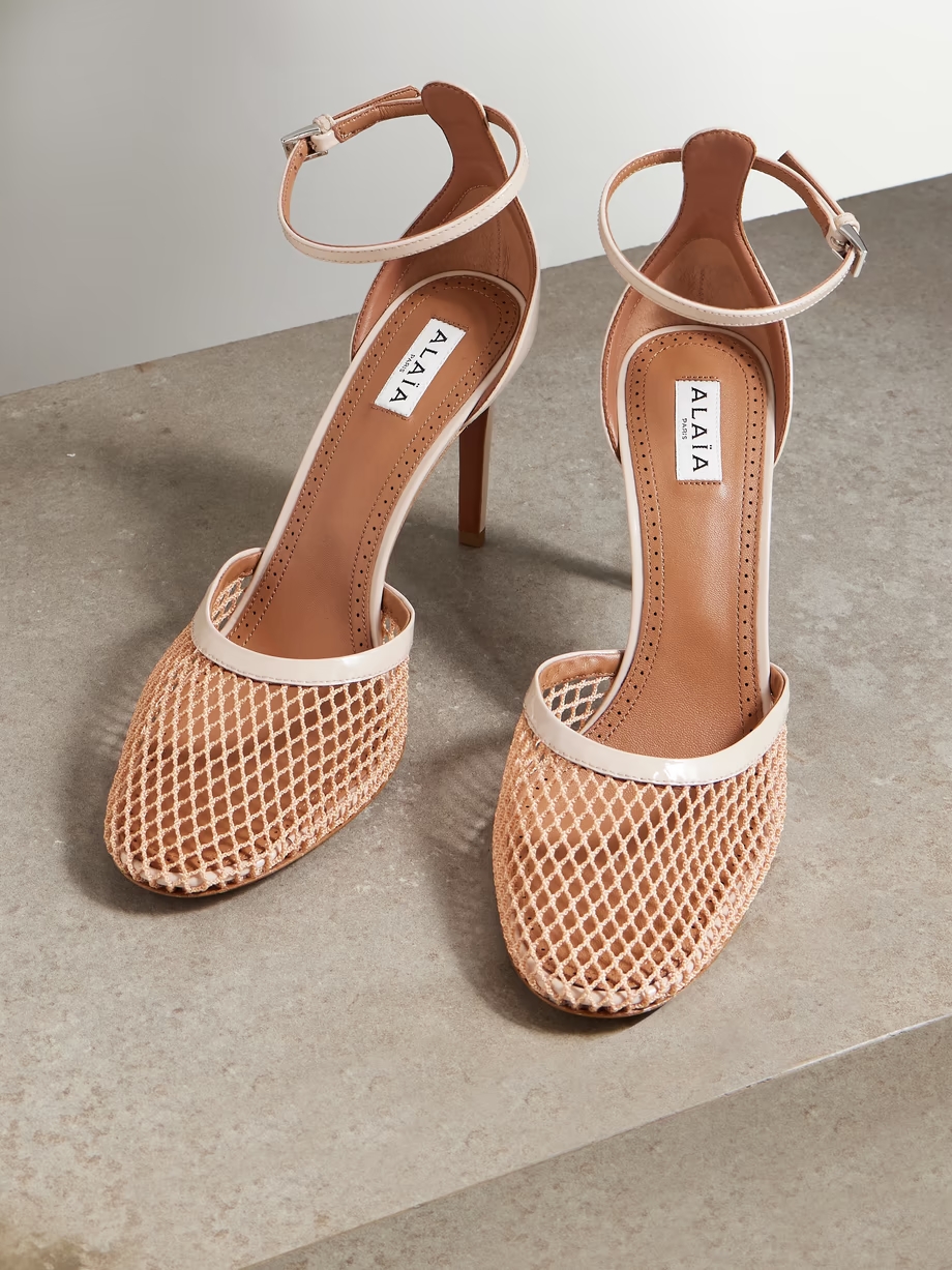 Fishnet and patent-leather pumps Fishnet and patent-leather pumps