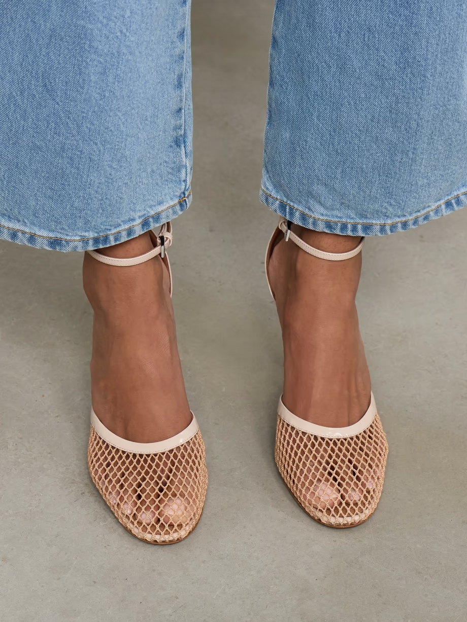 Fishnet and patent-leather pumps Fishnet and patent-leather pumps