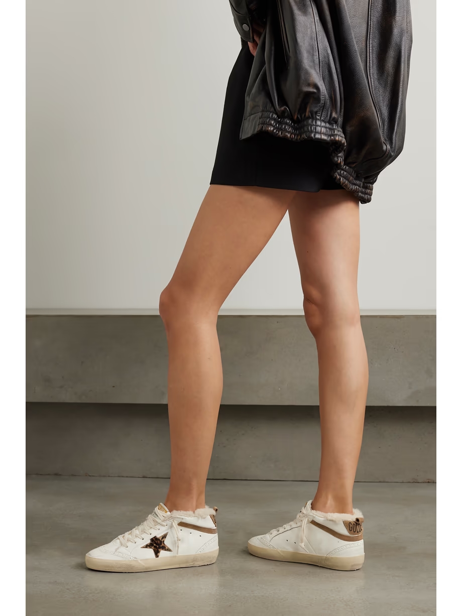 Mid Star shearling-lined distressed leopard-print calf hair, suede and leather sneakers Mid Star shearling-lined distressed leopard-print calf hair, suede and leather sneakers