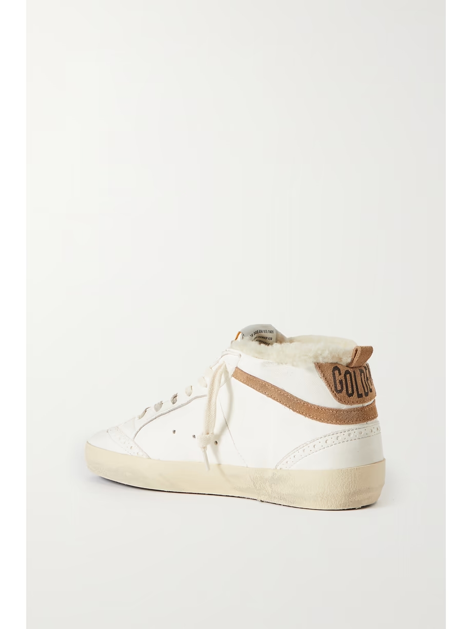 Mid Star shearling-lined distressed leopard-print calf hair, suede and leather sneakers Mid Star shearling-lined distressed leopard-print calf hair, suede and leather sneakers